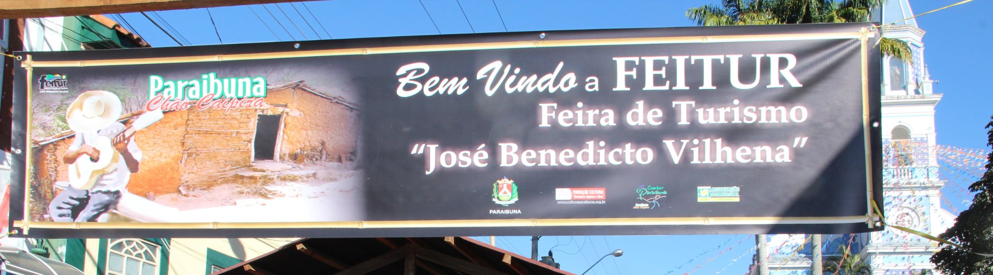 Cartaz anunciando a Feira de Turismo José Benedicto Vilhena, em Paraibuna