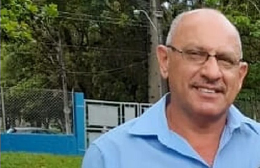 policia civil jesse de souza rocha com oculos, camisa azul, sorrindo. Polícia prendeu ultimo suspeito de tê-lo matado