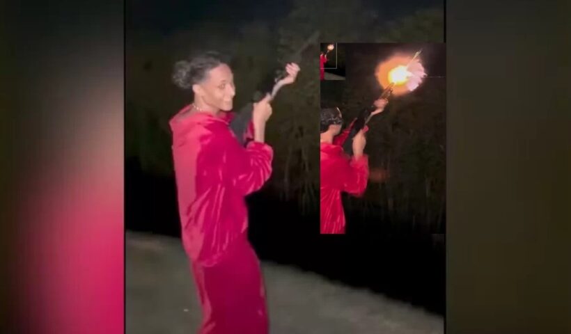 rapper Oruam disprando uma arma de fogo